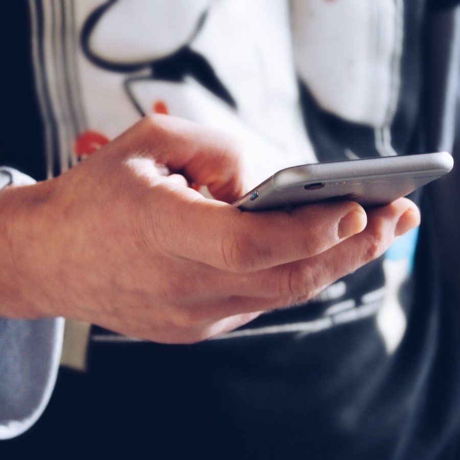 The young man texting message